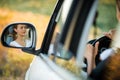 Pretty, young woman driving her car Royalty Free Stock Photo