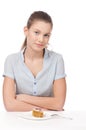 Pretty young woman eating cake. Isolated Royalty Free Stock Photo