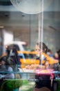 Pretty, young woman eating sushi in a restaurant Royalty Free Stock Photo