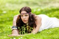 Pretty young woman in a headband daydreaming Royalty Free Stock Photo