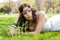 Pretty young woman in a headband daydreaming Royalty Free Stock Photo