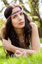 Pretty young woman in a headband daydreaming Royalty Free Stock Photo