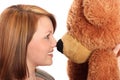 Pretty young woman and her Teddy Bear Royalty Free Stock Photo