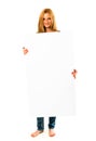 Pretty young woman holding a white banner Royalty Free Stock Photo