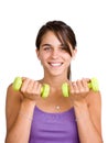 Pretty young woman lifting dumbbells