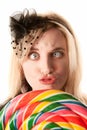 Pretty young woman with lollipop Royalty Free Stock Photo