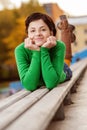 Pretty young woman lying on bench Royalty Free Stock Photo