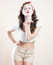 Pretty young woman pin up girl sending kiss Royalty Free Stock Photo