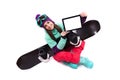 Pretty young woman in purple ski costume siting cross-legged, sh