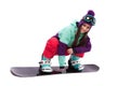 Pretty young woman in purple ski suit rides black snowboard Royalty Free Stock Photo