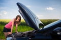 Pretty, young woman by the roadside Royalty Free Stock Photo