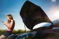 Pretty, young woman by the roadside Royalty Free Stock Photo