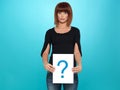 Pretty young woman showing a question mark Royalty Free Stock Photo