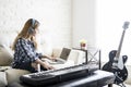 Female musician composing music at home Royalty Free Stock Photo