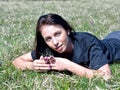 Pretty young woman smelling flower Royalty Free Stock Photo