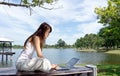 Pretty young woman surfing internet outdoors Royalty Free Stock Photo