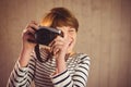 Pretty young woman taking photos Royalty Free Stock Photo