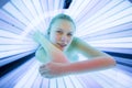 Pretty, young woman tanning her skin Royalty Free Stock Photo