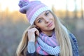 Pretty young woman wearing hat and scarf. Close up Royalty Free Stock Photo