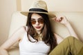 Pretty young woman wearing sunglasses and summer hat, fashion people concept hipster Royalty Free Stock Photo