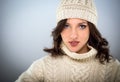 Pretty young woman in winter woollens