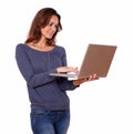 Pretty young woman working on laptop computer Royalty Free Stock Photo