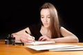 Pretty young woman writing a letter Royalty Free Stock Photo