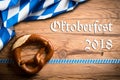 Pretzel with bavarian decoration and the message `Oktoberfest 2018`