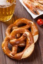 Pretzel, beer mug and grilled shrimps Royalty Free Stock Photo