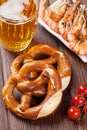 Pretzel, beer mug and grilled shrimps Royalty Free Stock Photo