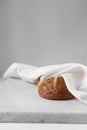 Pretzel buns on a parchment lined baking sheet Royalty Free Stock Photo