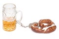 Pretzel chained with handcuffs to beer mug