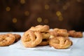 Pretzel cookies with sugar on a Christmas background. Sugar cookies. Royalty Free Stock Photo