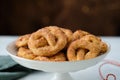 Pretzel cookies with sugar on a Christmas background. Sugar cookies. Royalty Free Stock Photo