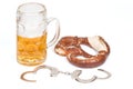 Pretzel with handcuffs and beer mug