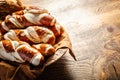 Pretzel sticks and pretzel rolls, Bavarian lye bun with salt in a basket Royalty Free Stock Photo