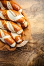 Pretzel sticks and pretzel rolls, Bavarian lye bun with salt in a basket Royalty Free Stock Photo