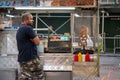 Pretzel vendor with food truck and no customers on New York street