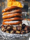 Pretzels and chestnuts on vendors cart Royalty Free Stock Photo