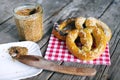 Pretzels with salt and grainy mustard, snack food for picknick