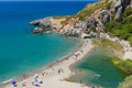 PREVELI, CRETE - JULY 21 2021: Crowds of people exploring the natural palm forest and sandy beach at Preveli on the southern coast Royalty Free Stock Photo