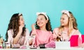 Prevent acne. Kids makeup. Happy girls doing makeup together. Sisterhood happiness. Skin care concept. Cosmetics for Royalty Free Stock Photo