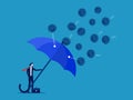 Prevent chaos problems. Businessman with umbrella protects from chaotic attacks