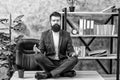Prevent professional burnout. Man bearded manager formal suit sit lotus pose relaxing. Way to relax. Meditation yoga