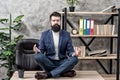 Prevent professional burnout. Man bearded manager formal suit sit lotus pose relaxing. Way to relax. Meditation yoga