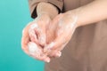 Prevention of coronavirus. Closeup of person washing hands isolated. Cleanliness and body care concept