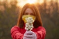 Preventive measures to protect against coronavirus. Young woman in a protective mask sniffs spring