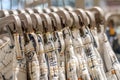 Preview jeans hanging on a hanger in the store