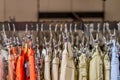 Preview jeans hanging on a hanger in the store