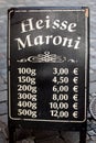 Price list sign for hot sweet chestnuts in germany
